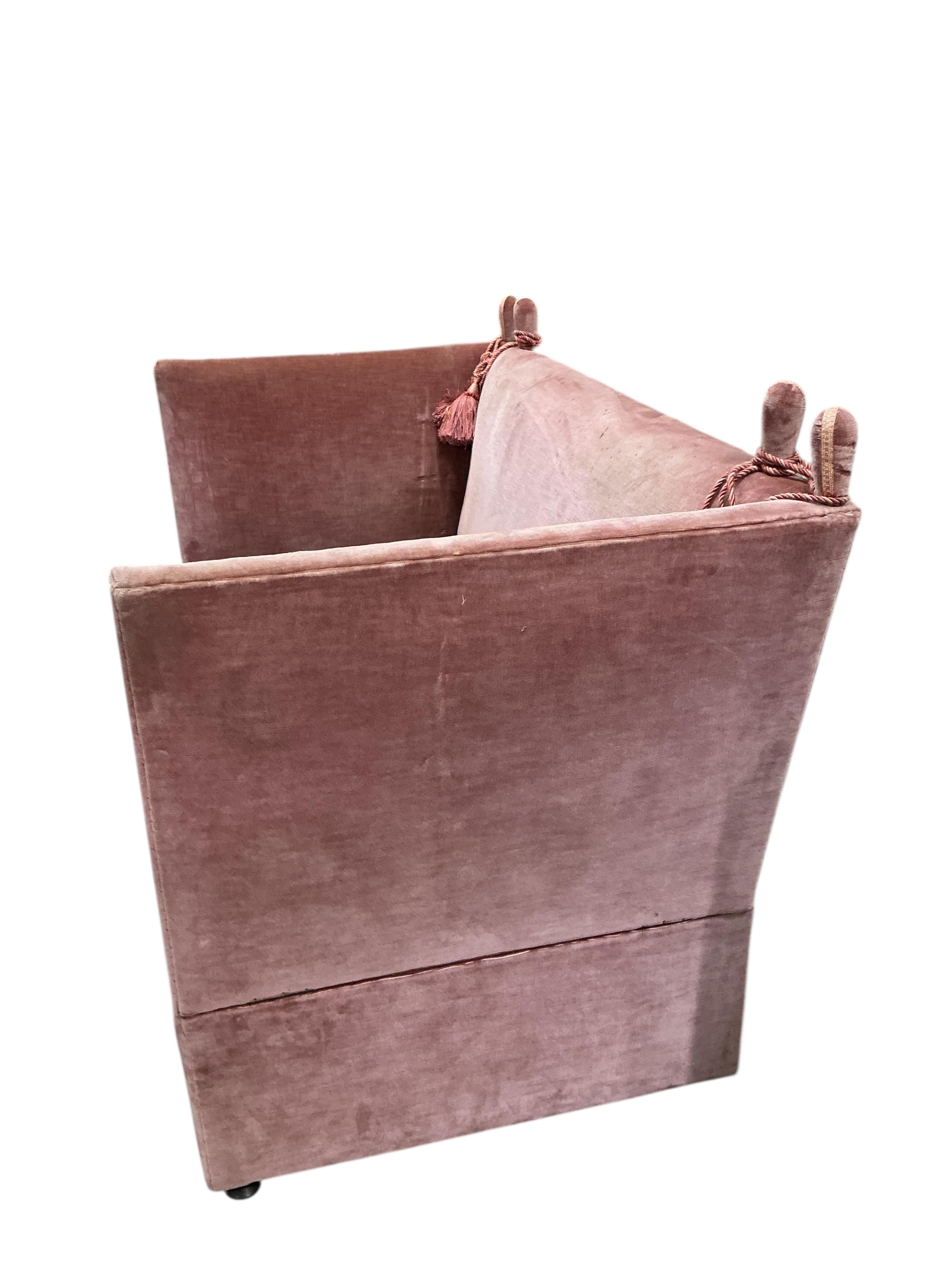 An upholstered two seater Knole settee, width 148cm, depth 84cm, height 101cm